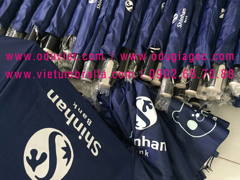 xưởng sản xuất ô dù cầm tay in logo quảng cáo